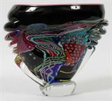 Lot# 1308 STUDIO ART GLASS VASE, 1991, H 8 3/4", L 10", Multicolored, illegibly signed and dated (see photo).
