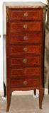 Lot# 1313 FRENCH FRUITWOOD SEMAINIER, H 48", W 16", D 12", With a breche d'alep marble top. One key escutcheon in drawer; ram's head mounts. Very similar to previous semainier.