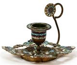 Lot# 1363 FRENCH CHAMPLEVÉ CHAMBER STICK, LATE 19TH C., W 4", Art nouveau floral and scroll motifs, brass accented with enamel in shades of blue, green, pink, red and white. Measures H.3 3/8" to the top of the handle. No apparent markings.
