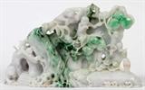 Lot# 2086 CARVED JADE LANDSCAPE, 5" X 7 1/4" X 1 1/4", In white, green and brown colors. Depicting monkeys, trees, fruit and flowers.