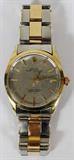 Lot# 2182 ROLEX MAN'S OYSTER PERPETUAL GOLD AND STAINLESS WRIST WATCH, Superlative chronometer, officially certified. Stamped 14k. From the estate of Gerry Culpepper, Northville, Mi.