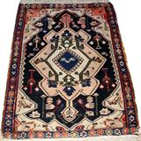 Lot# 2198 SERAPI FLAT WOVEN RUG, CIRCA 1900, 4' 10" X 3' 10", Fine weave.  Small corner missing.  Edges somewhat unraveled.  Good colors [beige and navy] and design. From the estate of Gerry Culpepper, Northville, Mi.