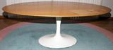 Lot# 2303 SAARINEN TULIP BREAKFAST  TABLE H 28", W 48", L 70", Oval shape. White enameled pedestal base. Natural wood top. [needs refinishing]. No labels. From the estate of Gerry Culpepper, Northville, Mi.