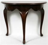 Lot# 2301 ITALIAN CARVED WALNUT DEMILUNE CONSOLE TABLE, 19TH C., H 30", W 37", D 20", Scalloped apron with shell motif; tall cabriole legs having pad feet.
