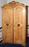 Lot# 2302 PINE PRIMITIVE ARMOIRE, H 78", W 45 1/2", D 24", Double doors open to interior shelves. Country piece. Carved crest. From the estate of Gerry Culpepper, Northville, Mi.