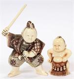 Lot# 2394 CHINESE CARVED IVORY CHILD WARRIOR AND SUMO WRESTLER TWO PIECES, Child in warrior costume H 2 1/3". Child as sumo wrestler 1 3/4". Polychrome.