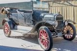 Lot #161, Vintage Ford 1921 Model T Unrestored Car
Appears to be a 1921 Model T Ford in Unrestored condition, car looks to be nearly complete. This car belonged to the grand Parents of the consignor and was driven to Arizona from back east many , many years ago then parked. It has been on the carport of the consignor since the 1950's! Engine is not frozen and appears complete less the glass oil or fuel gadget that is near the bottom of the engine. The consignor is looking for the title but as of this listing has not found it yet. Will be sold on a bill of sale "no title" unless it is located prior to auction date. A fantastic restoration project. Be sure to see lot #400A also in this auction, a 1931 or 32 Ford Pick Up in great condition! Tag words: Vehicle, Motor, Collector Car, Car Show, Retro, Antique, Vintage 