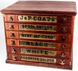 Lot #182, Furniture Antique J. & P. Coats Thread Cabinet
A very nice antique J. & P. Coats sewing spool / thread store counter display case. The cabinet appears to be walnut. It is well constructed with tongue and groove joints. The box is decorated with applied color label advertising logos reading "J & P Coats Best Six-Cord Spool Cotton" and the back has an image of spool of white thread. It features six pull out front drawers with brass knob hardware. Drawers have been labeled: - J. & P COATS - SPOOL COTTON - BEST SIX CHORD - BLACK - WHITE - ASSORTED COLORS These cabinets were produced circa 1877 in a variety of colors and styles for merchants to place on their counters for display. In beautiful condition, all original finish, it shows light surface wear. Measures 20.25 tall x 24.5" wide x 17.5" depth. A very nice piece of history; this would be excellent for a sewing or craft room! From the internet: "John Clark of Glasgow, Scotland (the “J” in J. & P.) invented the spooling machin