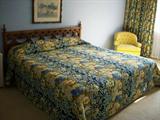 King size headboard, frame and mattresses. Comforter is also available, but needs some repair. Yellow chair is for sale also.