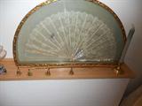 Mother of Pearl stays on this framed fan, has hand painted birds. Gorgeous!