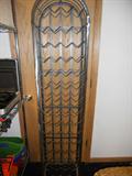 3 large wine racks and one shorter one