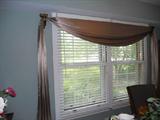 Window treatments are for sale...just not the mini blinds