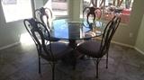 Glass top table and 4 chairs