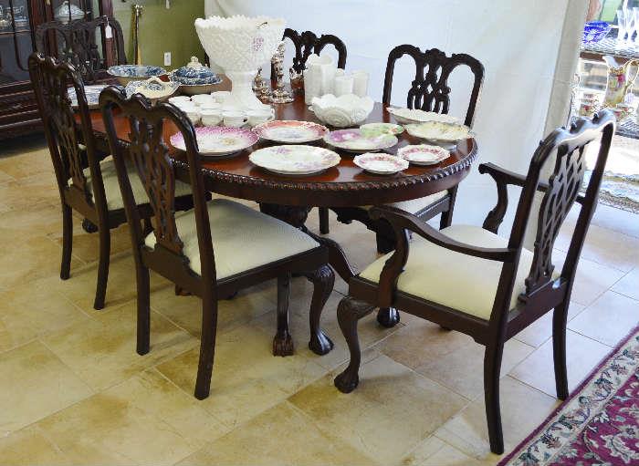 highly carved mahogany dining table and 6 chairs