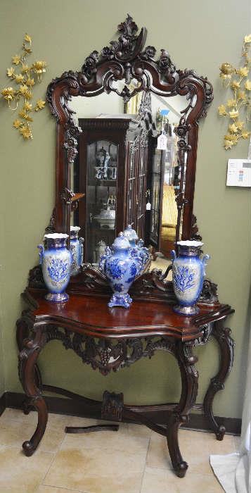 highly carved mahogany table with mirror