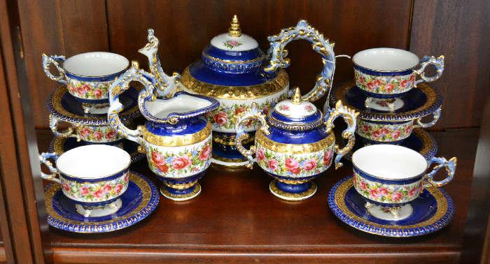one of several beautiful tea/coffee services, this one floral with blue and gold trim