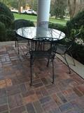 1 of 4 round wrought iron tables and chairs sets