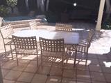 Brown Jordan outdoor patio set Table with 2 chase lounges and end table. 