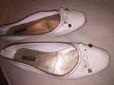 YSL cream flats with gold trim