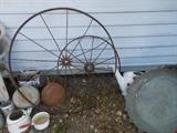 Iron wagon wheels/large one has a mate