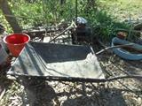 Iron wheelbarrow & other rusty treasures