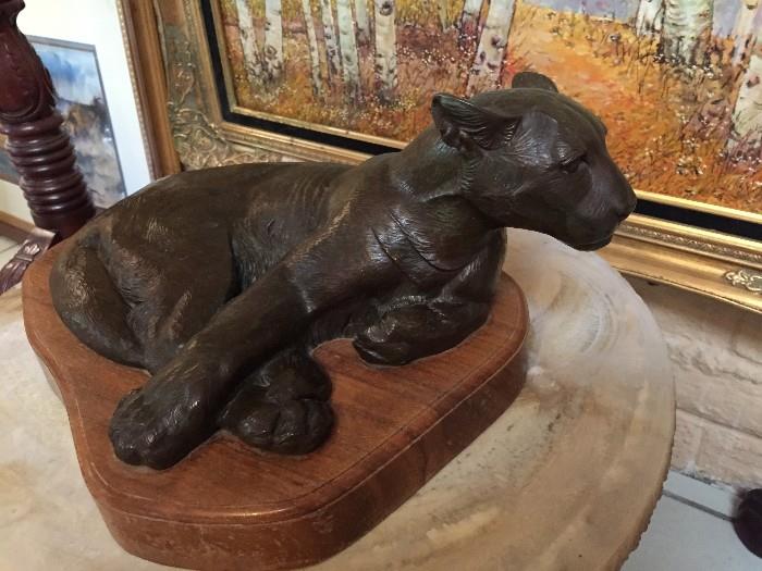So many bronzes.  This one is a reclining mountain lion by Nick Wilson.  We have his art work too!