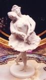 73/46  Figural Group.  A contemporary American limited edition bisque figural group.  Male and female ballet dancers on a circular self base.  Titled:  "Swan Lake".
From the Franklin Mint
9 1/2" high:  $120.