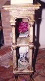 96/313  Pedestal.  A 19th century European three tier onyx pedestal with molded top supported by onyx columns bearing gilt bronze capitals and bases separating a center and lower shelves with ormolu trim.  On scrolling gilt bronze legs.
Note:  The top is cracked with a segment missing.
14" square x 42" high
As is:  $1750.00