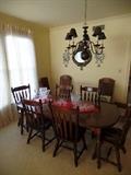 Early American Dining room set with 6 chairs and three extra leaves