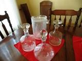 Etched glass decanters and several matching glass sets with ship motives