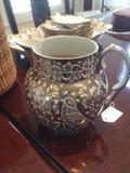 Antique silver resist pitcher
