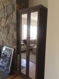 One of a pair of mirrored closets