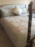 Upholstered king bed w/matching bed linens