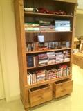 CDs, dvds,vhs in pine bookcase