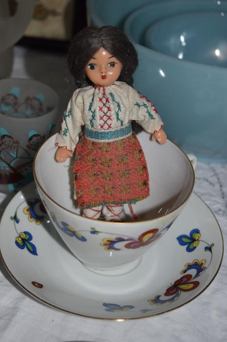 The doll was purchased by a family member. The Farmer's Rose teacup is still available. 