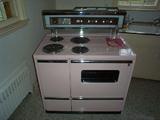 one of the best rare GE 1950’s pink stove model J-408 with a matching pink refrigerator, only one year in production in pink, absolutely working and showroom condition!