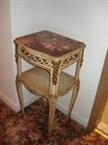 pink marble-top side table.
