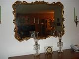 Large decorative gold leaf mirror.