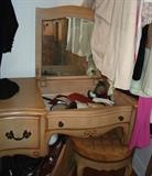 Lift top vanity and round seat.