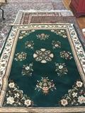 GREEN WOOL AREA RUG 5.7 X 8.3
