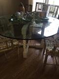 GLASS TOP ROUND KITCHEN TABLE ( SOME CHIPS IN GLASS )
