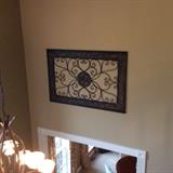 This large metal wall decor piece makes a statement.