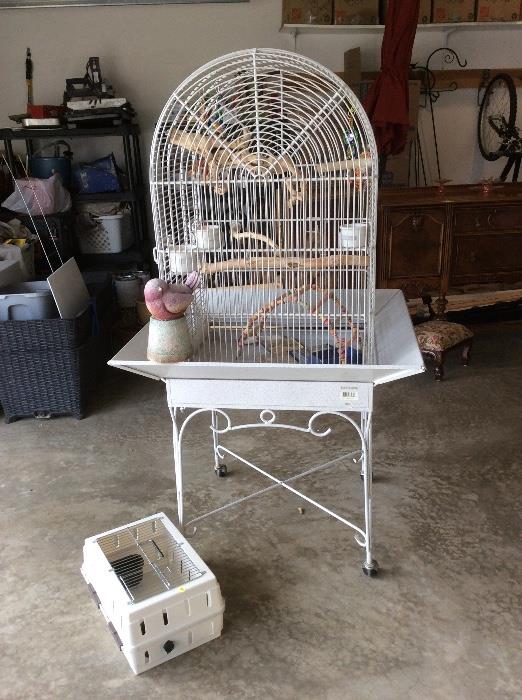 Everything you need for your feathered friend! This large bird cage on casters is by California Cages. It is the Sedona model.