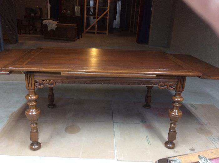 Gorgeous dining room table. We have 6 chair to match. One is a captain!!!!!! See next picture
