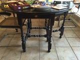 Antique dark mahogany gate legged table, 48 round, drop leaf with drawer.  