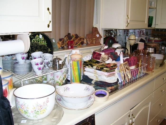 Kitchen linens, small appliances, bake ware, tea cups/saucers...we have it all!