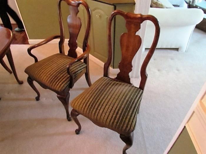 2 arm cherry chairs and 4 arm less cherry chairs.