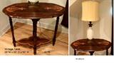 This decorative vintage table is uniquely carved and bi-stained. $275                                                           
