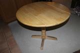 Drop leaf pedestal pine kitchen table.
