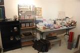 Office supplies, CDs, DVDs, VHS, book cases, bakers rack.